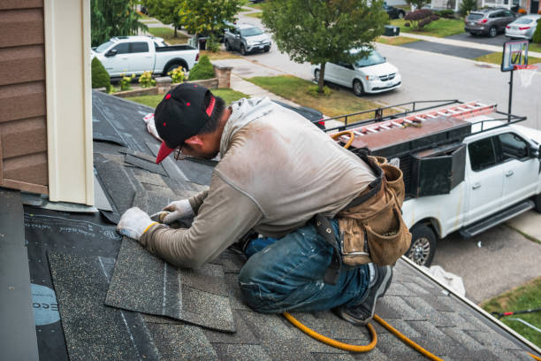 Professional Roofing technician working in Tioga, ND
